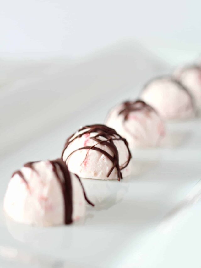 Strawberry Fat Bombs with Chocolate Drizzle on a white plate