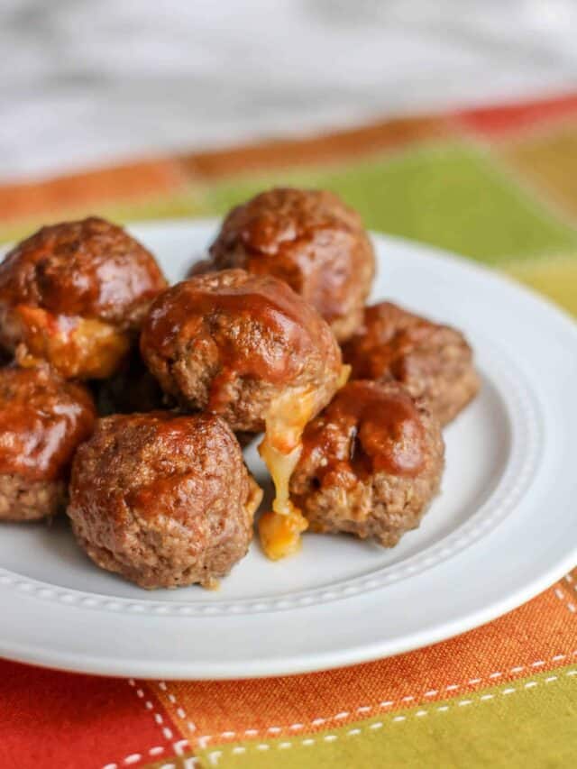 A plate of food, with Meatball