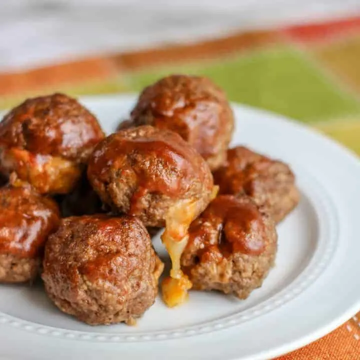 A plate of food, with Meatball