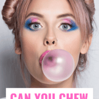 women blowing a bubble with gum
