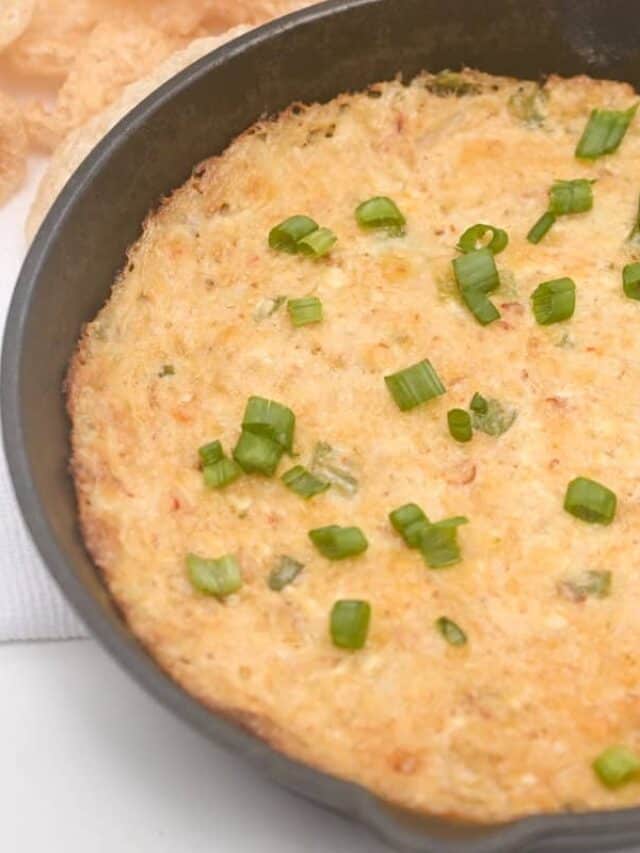 Crab Rangoon Dip in skillet with green onions
